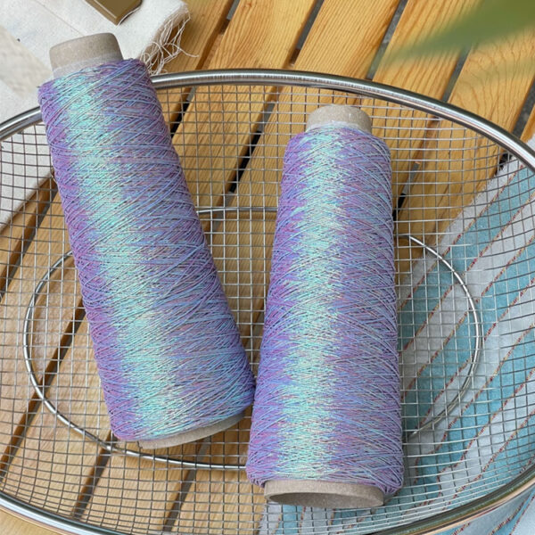 Shiny silver and gold yarn woven INS thread