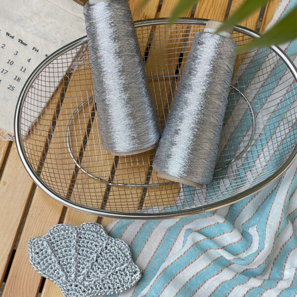 Shiny silver and gold yarn woven INS thread